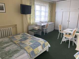 Мотели Samana Tytuvėnai Четырехместный номер эконом-класса с общей ванной комнатой-1
